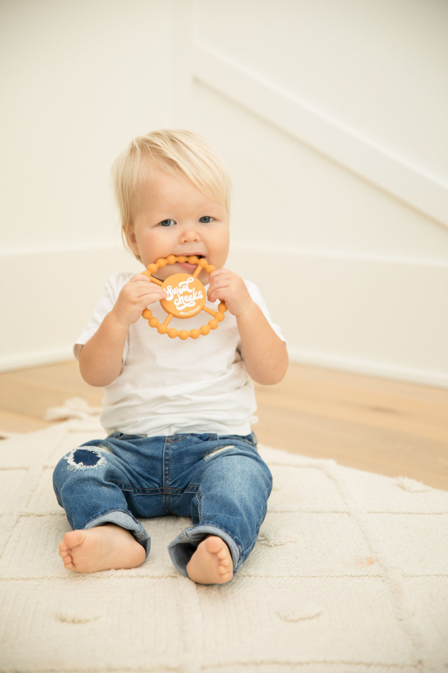 Sweet Cheeks Happy Teether